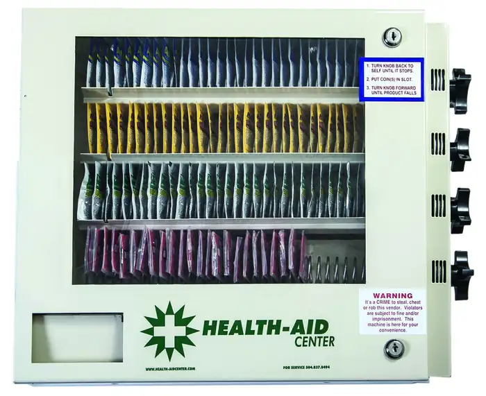 Health-Aid four-select vending machine, front view, with four coil rows of packeted product and four selection knobs
